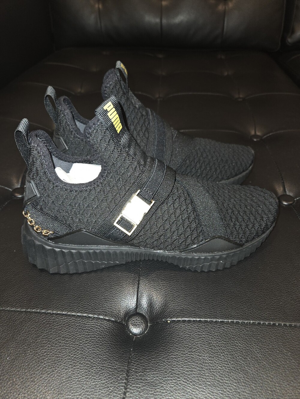 Puma Black Knit Slip-On Trainers with Gold Accents - Picture 2 of 7